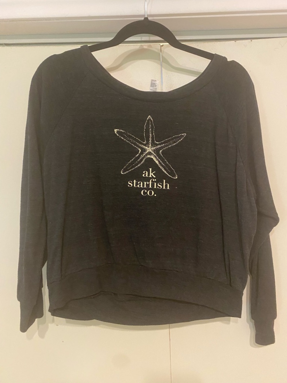 American Apparel Black T-Shirt with White Tag and Blue Logo